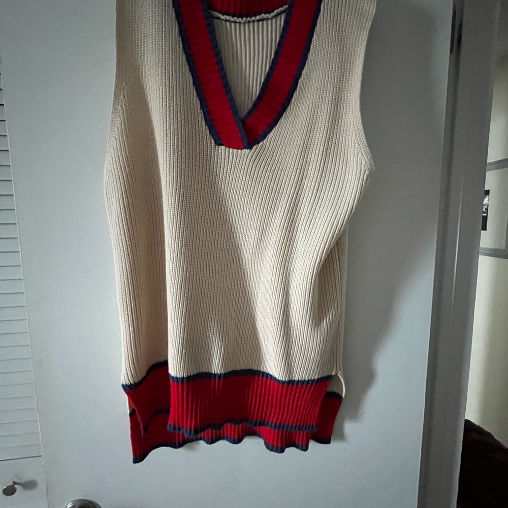 Cream Sleeveless Sweater with Red and Blue Trim